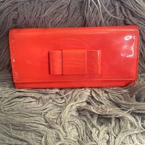 Miu Miu Orange Patent Leather Bow Clutch *transfer marks